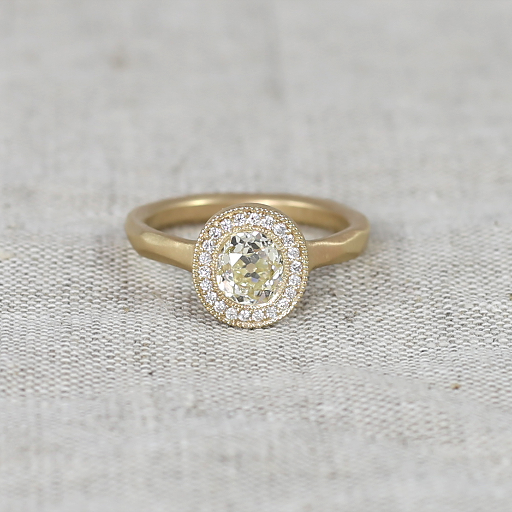 Custom 14K gold engagement ring with old mine cut recycled daimond