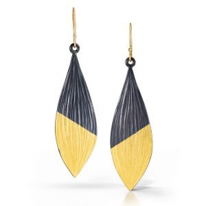 Gold and silver earrings by Kendra Renee