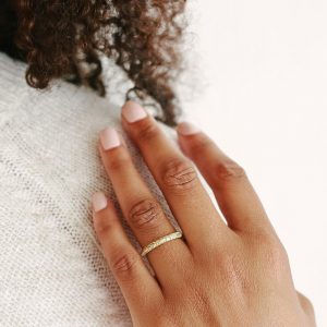 18K gold uniquely textured wedding band