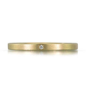 Propose with this simple gold and diamond ring